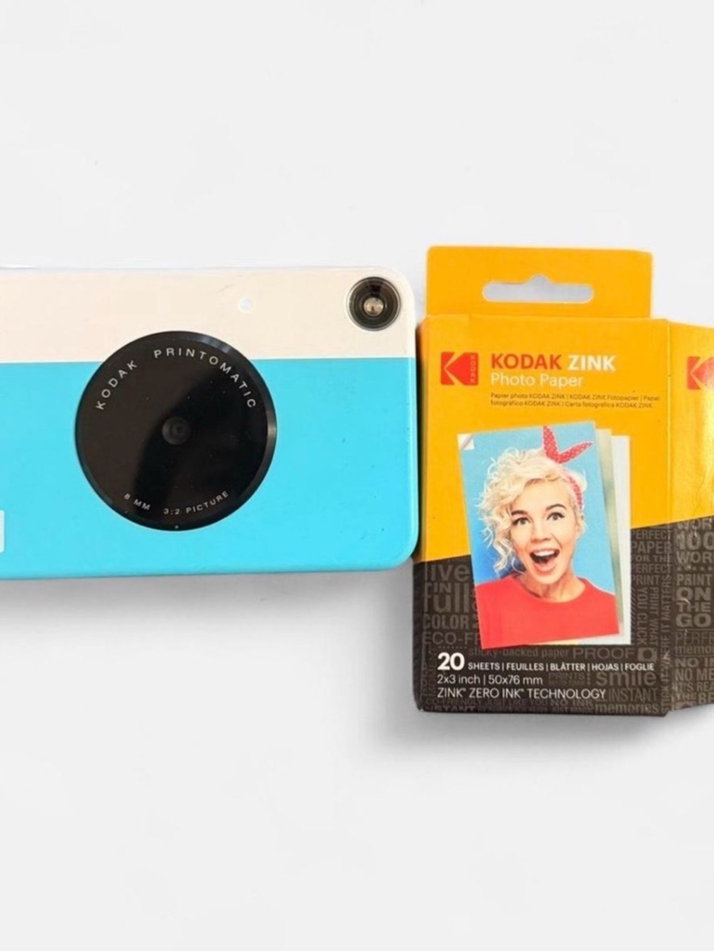 Kodak Printomatic Camera with Bright Turquoise Body and Yellow Kodak ZINK Paper